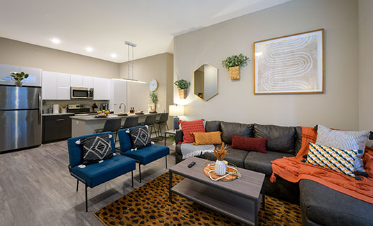 Furnished apartment featuring an open floor plan